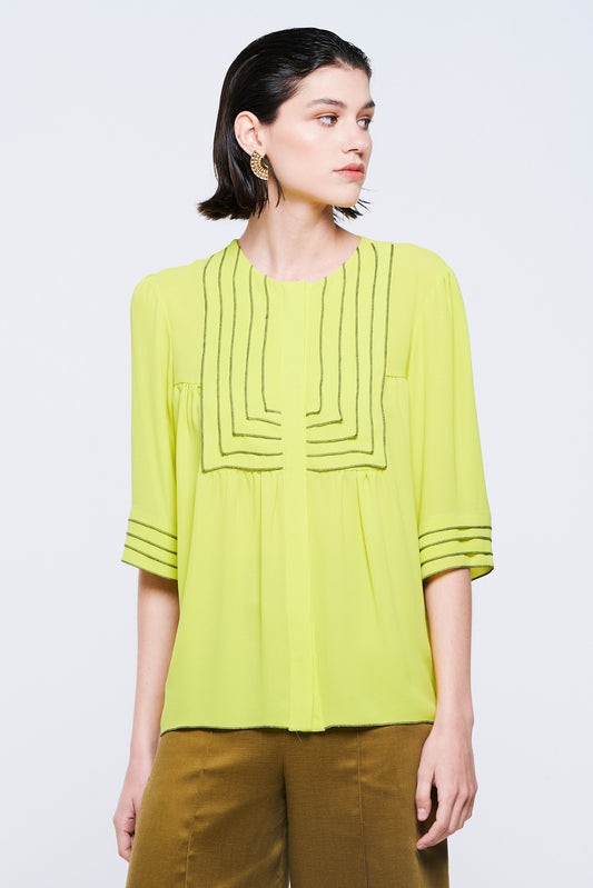 Shirt with lime pleats